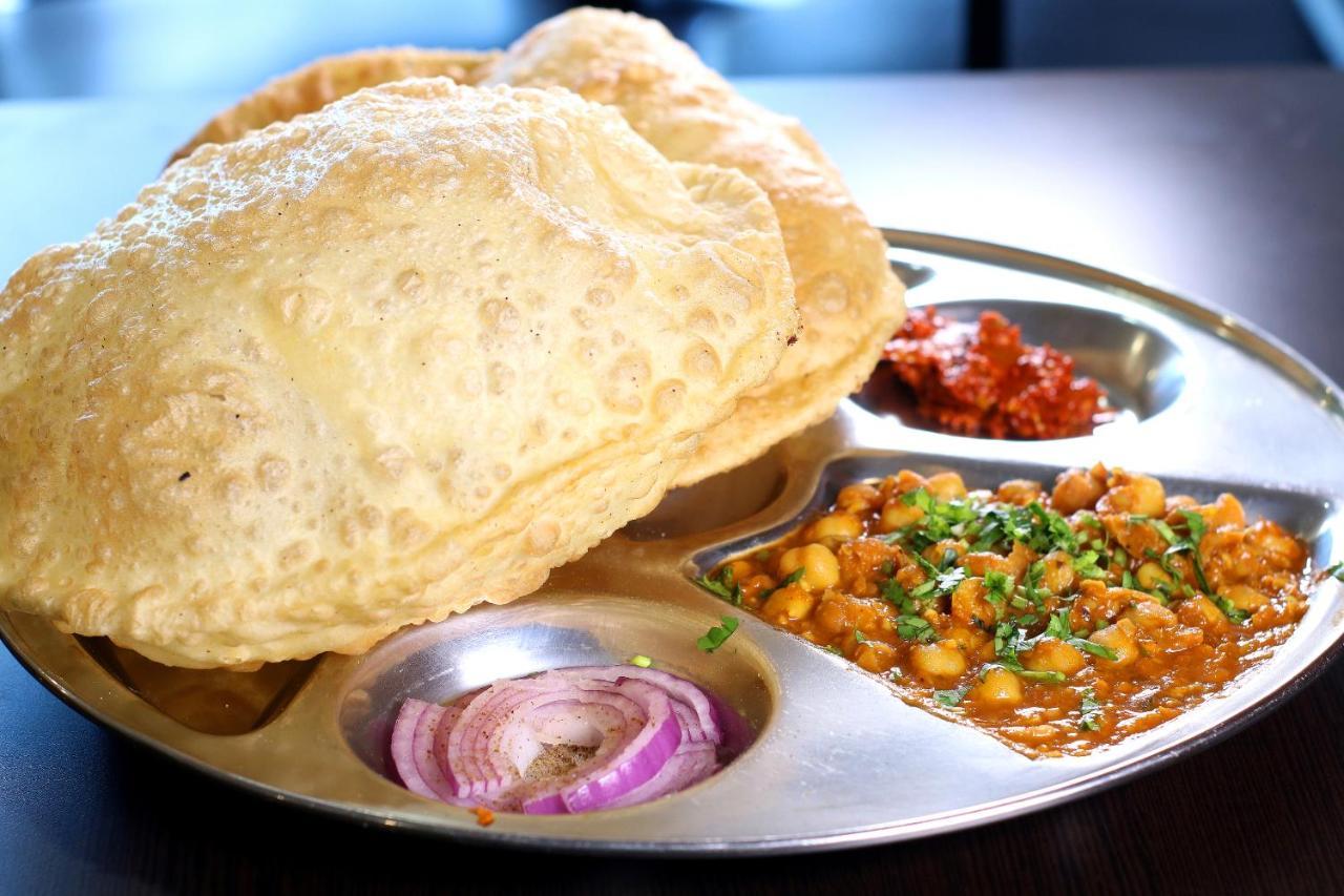Oyo Flagship 4434 Earth Inn Lucknow Bagian luar foto